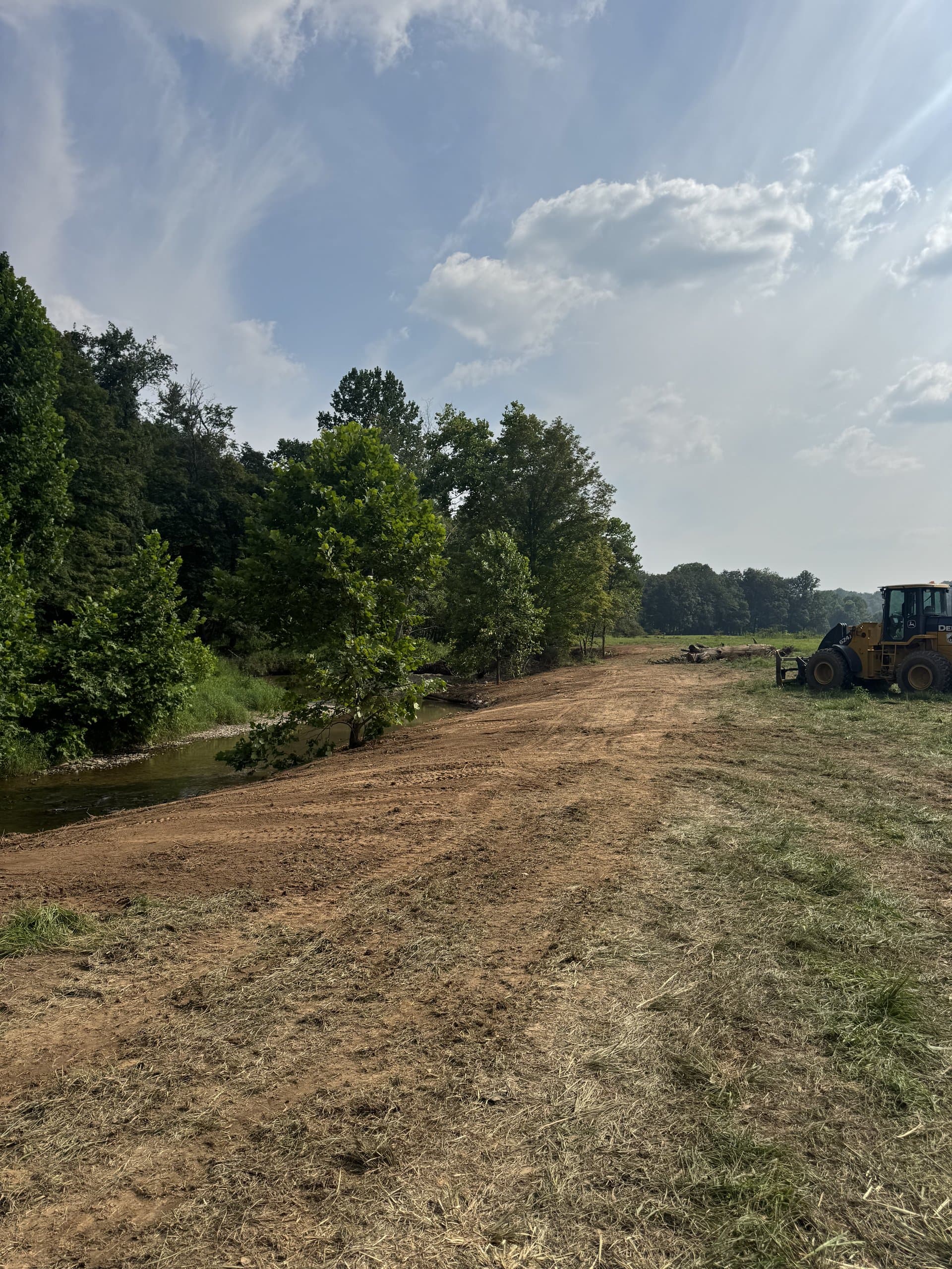 Re-shaped stream banks waiting on hydroseed