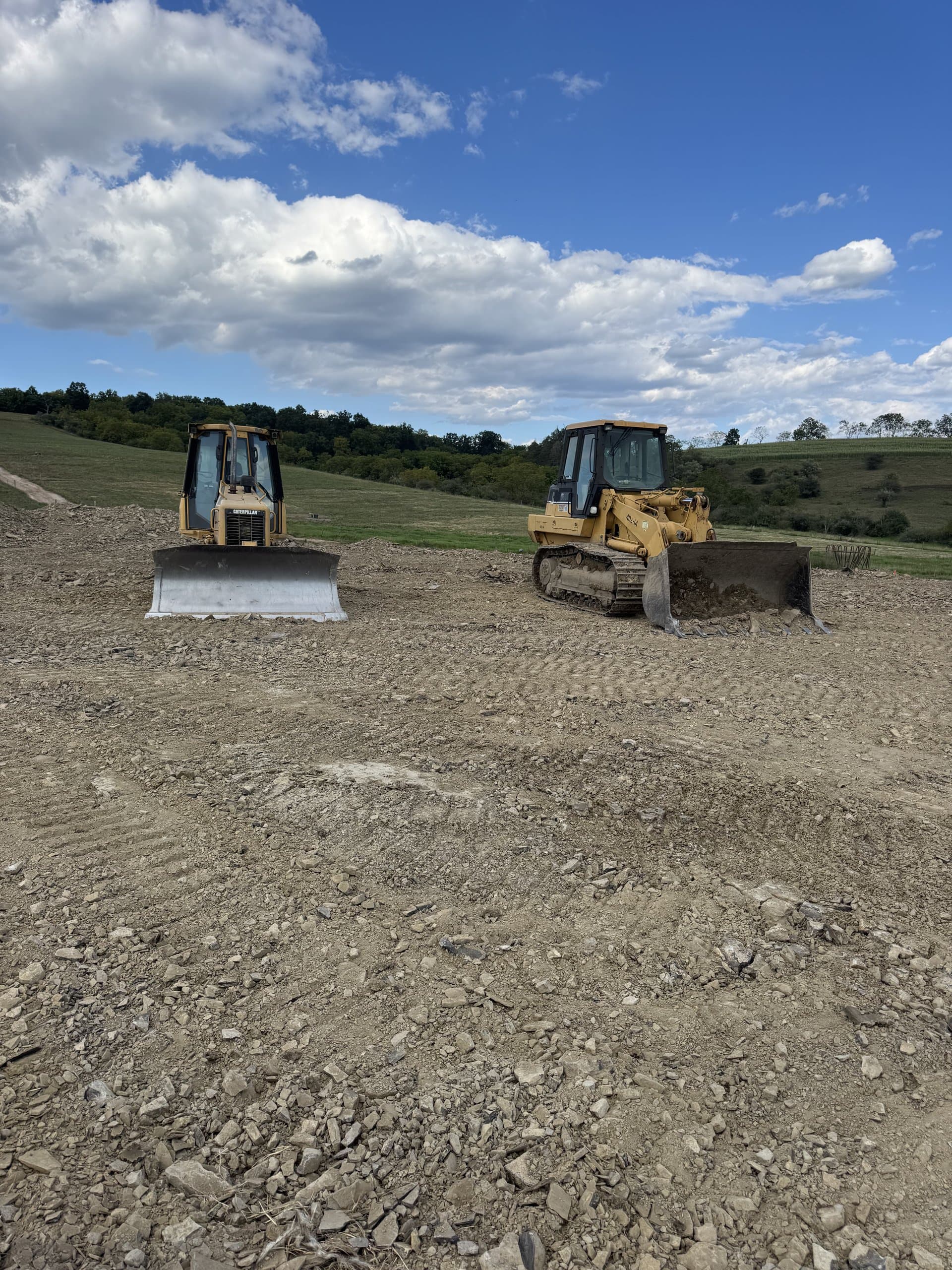 Excavator cutting in a new foundation pad