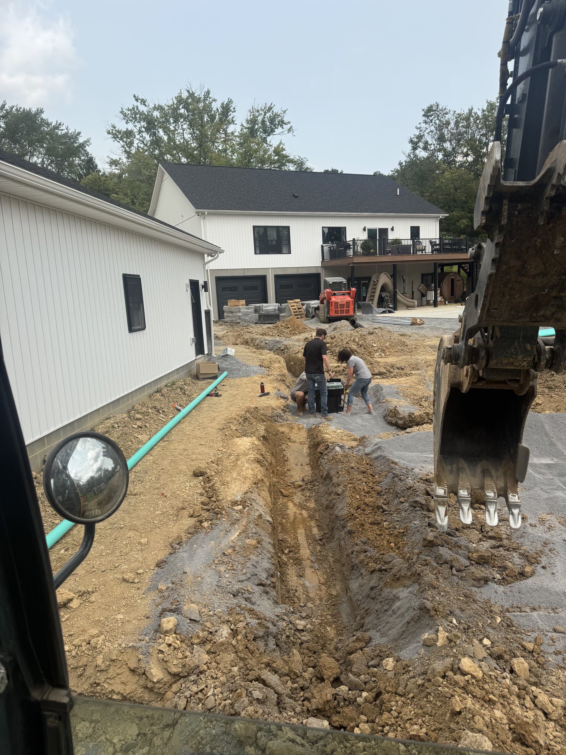Bulldozer pushing a fresh cut into shape on a Bedford site
