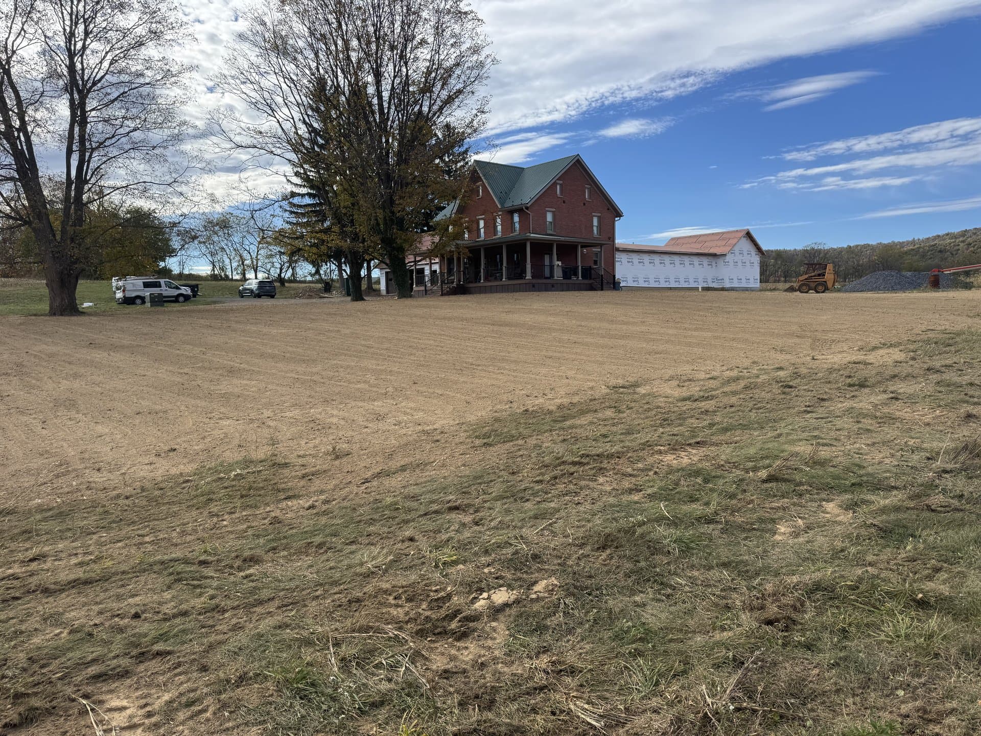 Finished outbuilding pad with the surrounding ground graded