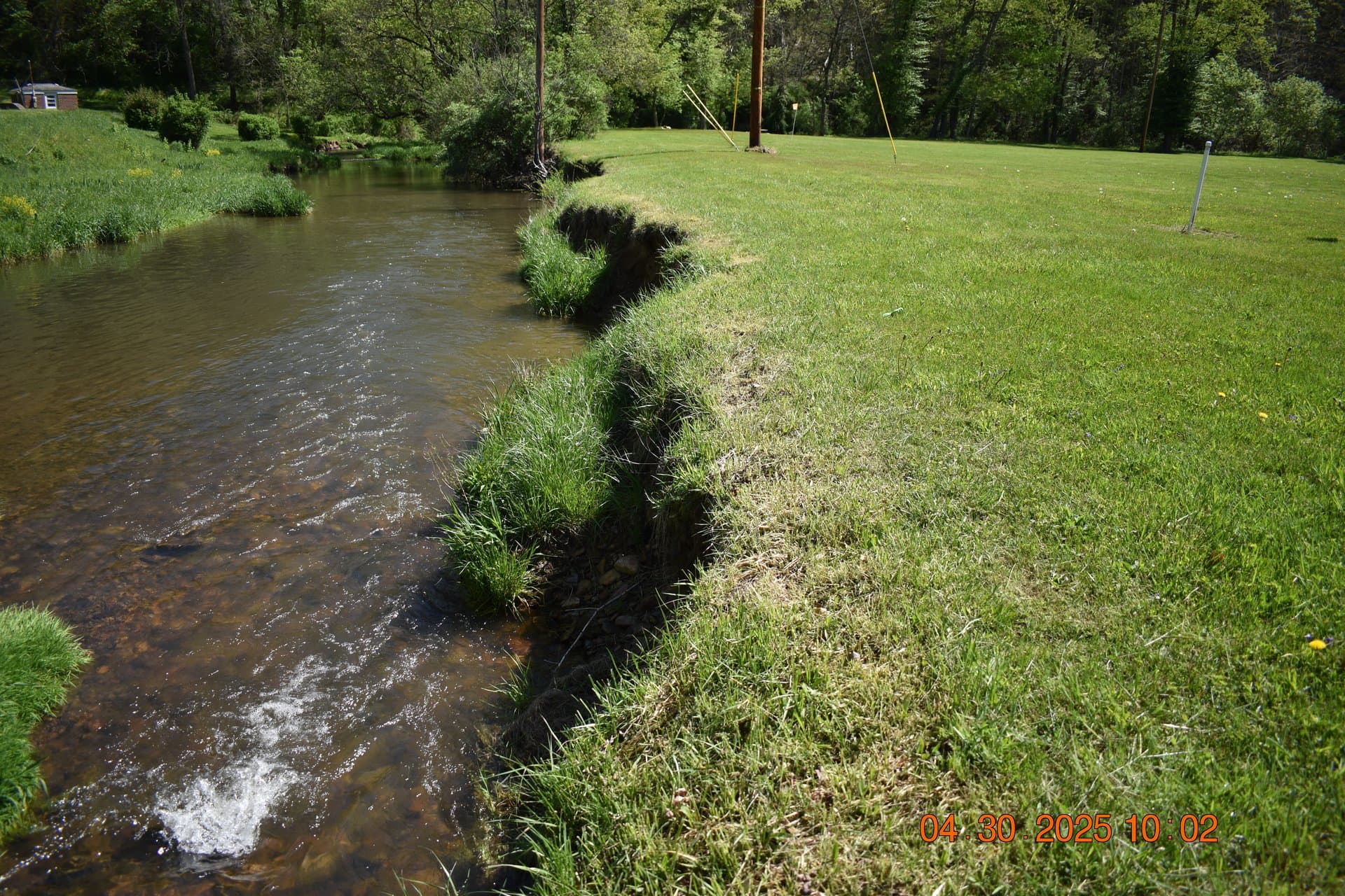 Severely eroded streambank cutting straight into a Bedford County yard